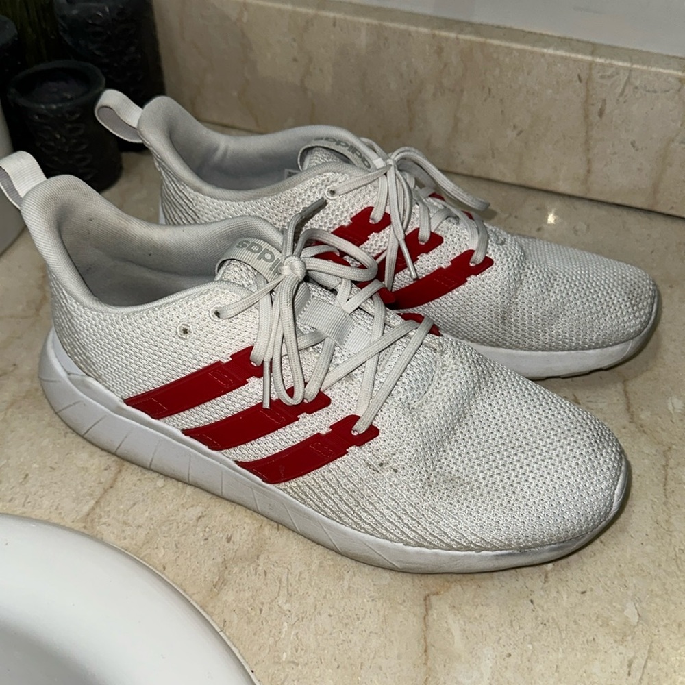 White & red Adidas shoes
